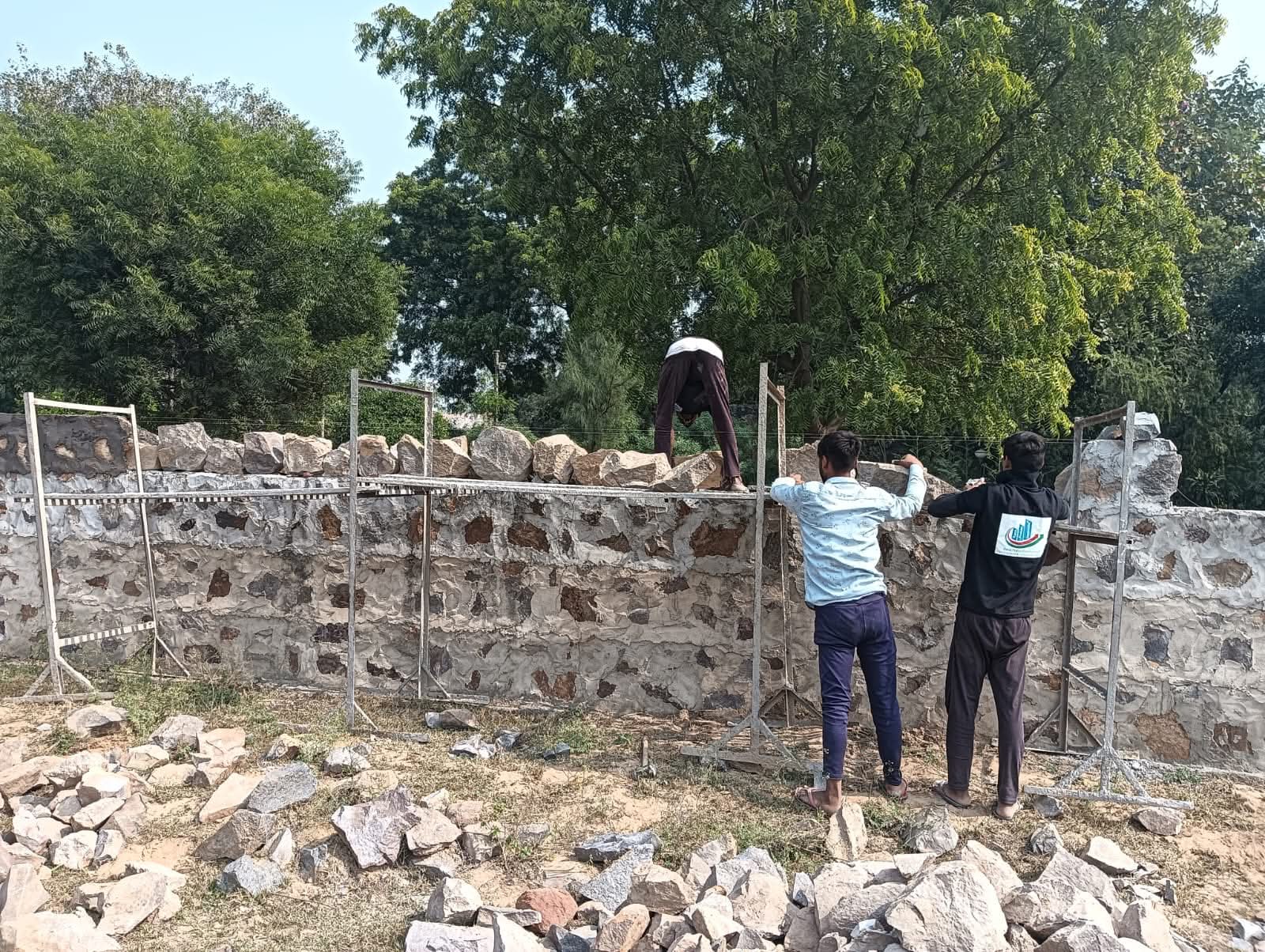 Selected angular stone boulders used for random rubble masonry compound walls