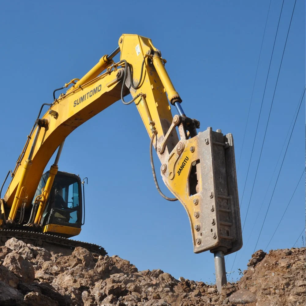 Heavy hydraulic breaker mounted on a 20-ton tracked excavator