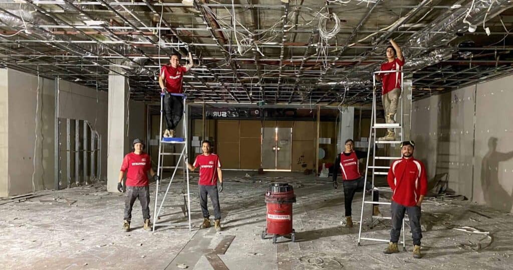 Bare-shell commercial floor plate after partition, ceiling and flooring strip-out